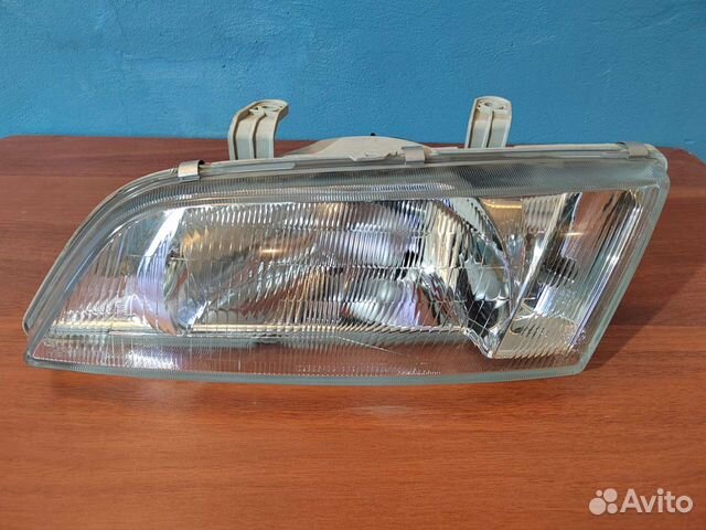 Фара левая Nissan primera
