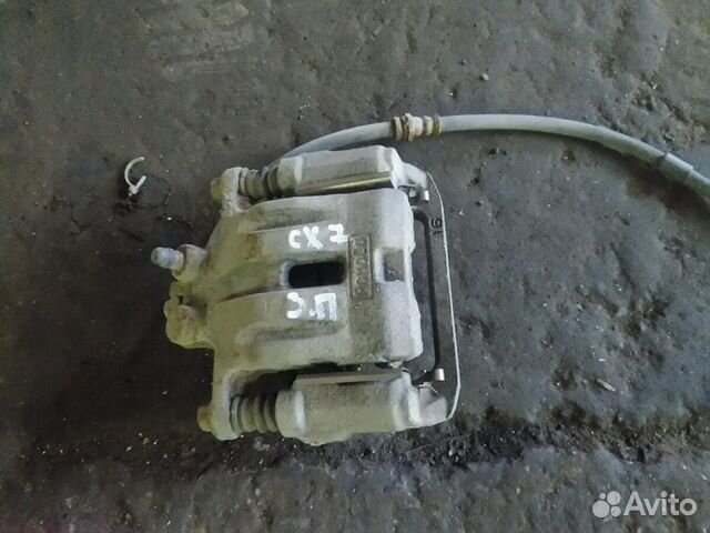 Суппорт тормозной задний правый мазда сх7