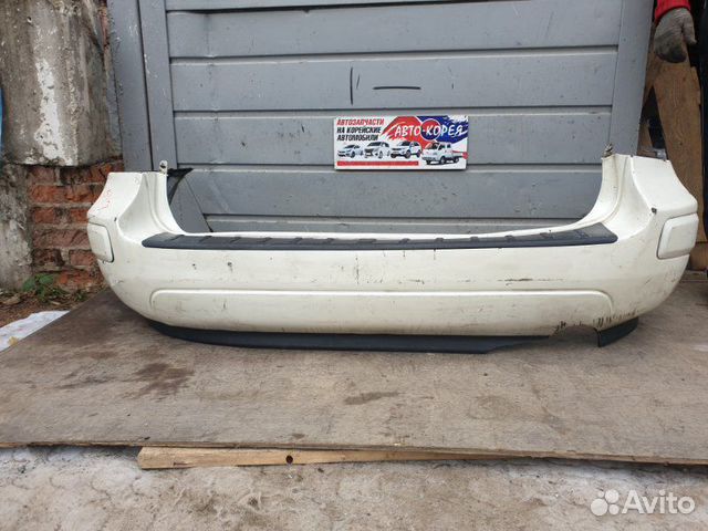 Бампер задний Kia Carens 2004-2010