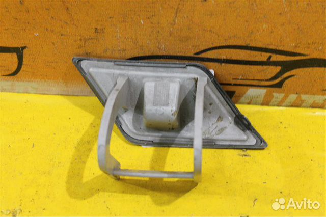 Крышка форсунки омывателя фар передняя левая