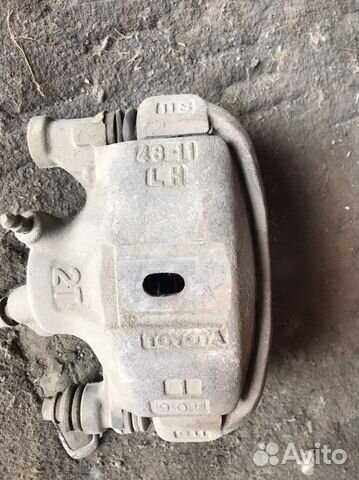 Суппорт передний левый на toyota corolla II