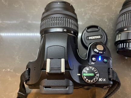 Pentax k-x новый в упаковке с объективом