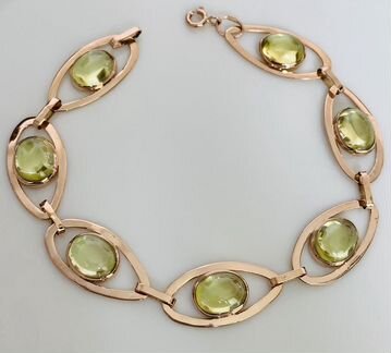 Золотой браслет с хризолитами